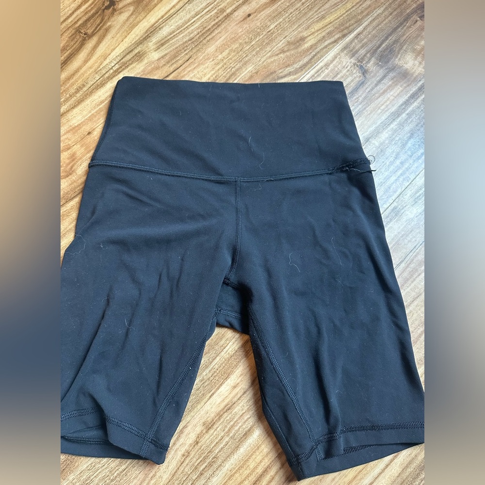 Black lululemon 6 inch biker shorts size 4